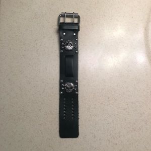 Black leather wristband with skull details